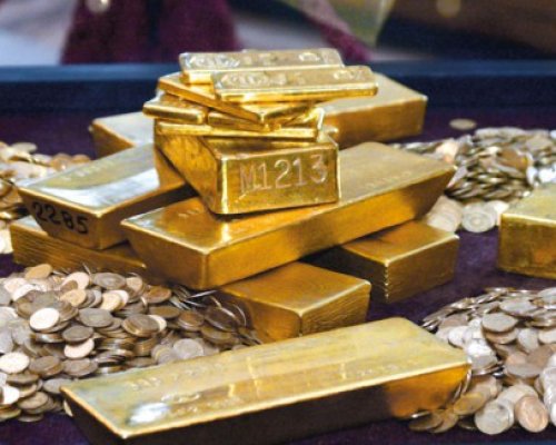 Preţul aurului a atins minimul ultimilor doi ani şi jumătate după şedinţa Rezervei Federale